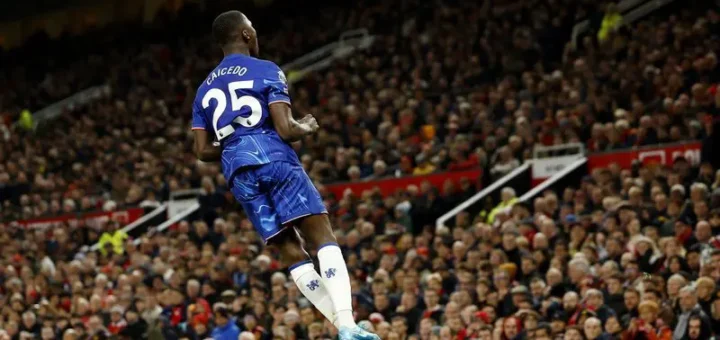 Premier League Soccer - Manchester United vs. Chelsea - Old Trafford, Manchester, UK - November 3, 2024. Chelsea's Moises Caicedo celebrates after netting their opening goal. (Credit: Action Images via Reuters/Jason Cairnduff)
