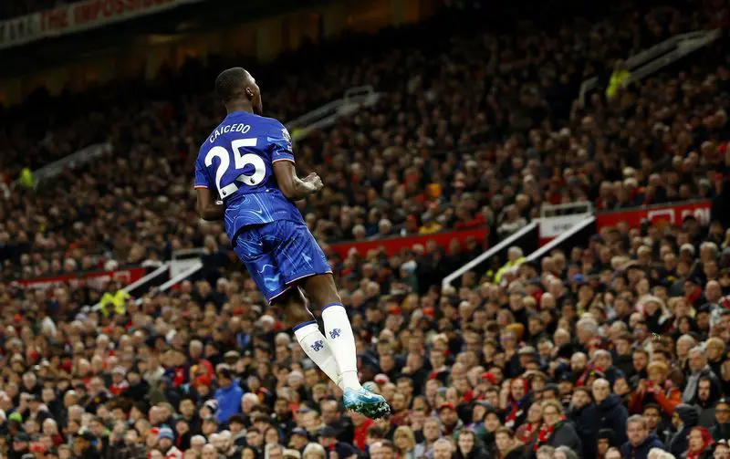 Premier League Soccer - Manchester United vs. Chelsea - Old Trafford, Manchester, UK - November 3, 2024. Chelsea's Moises Caicedo celebrates after netting their opening goal. (Credit: Action Images via Reuters/Jason Cairnduff)